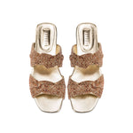 Rhea Sahara 2 Knot Sandal featuring handcrafted knot details and metallic threads on a cushioned leather base.