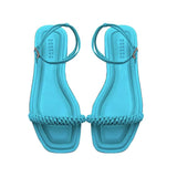 Rovena Aqua Flat Ankle Sandal in vibrant turquoise with braided strap and removable ankle strap.