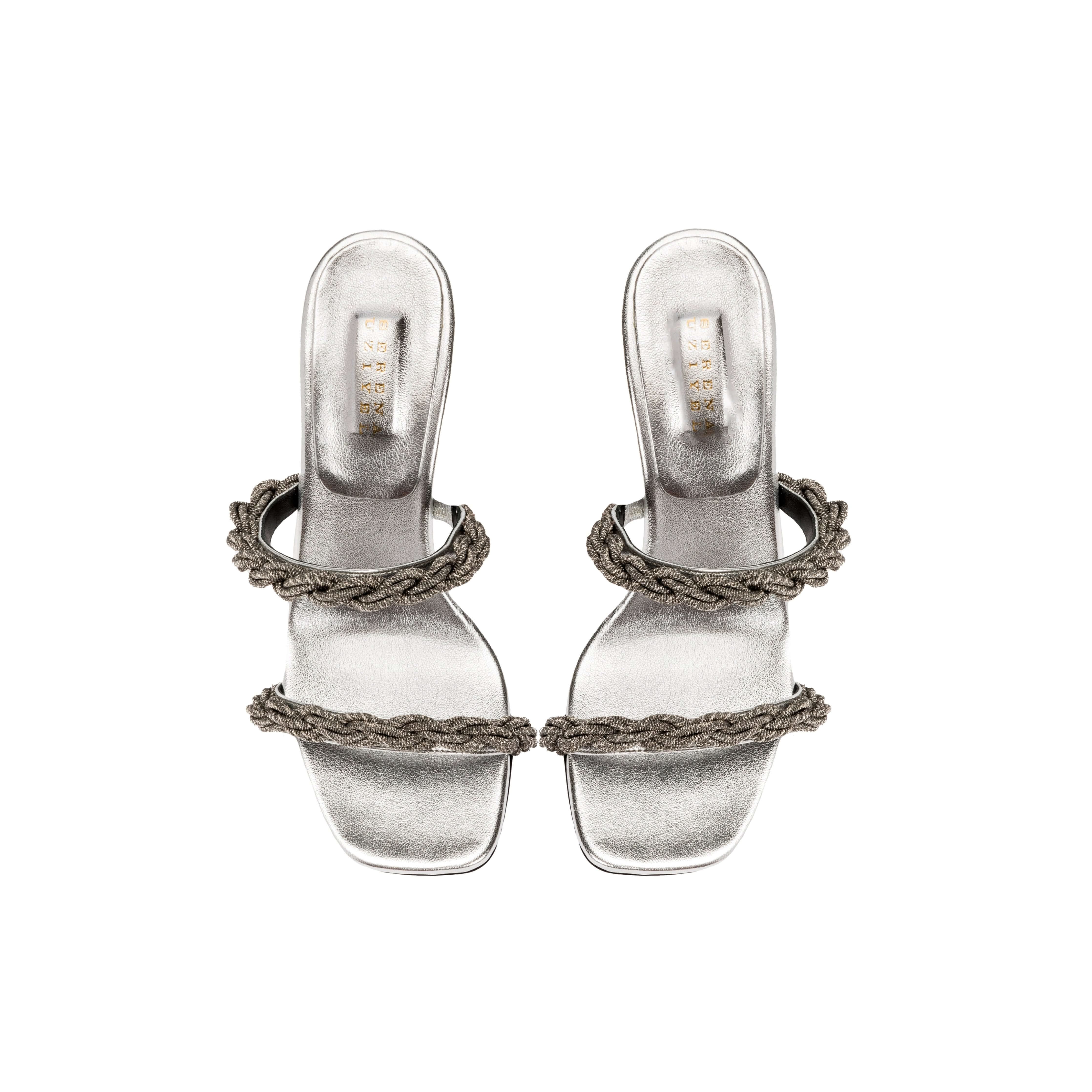 Roxana silver high-heel sandals with two twisted straps, handcrafted in Italy, perfect for elegant evening wear.