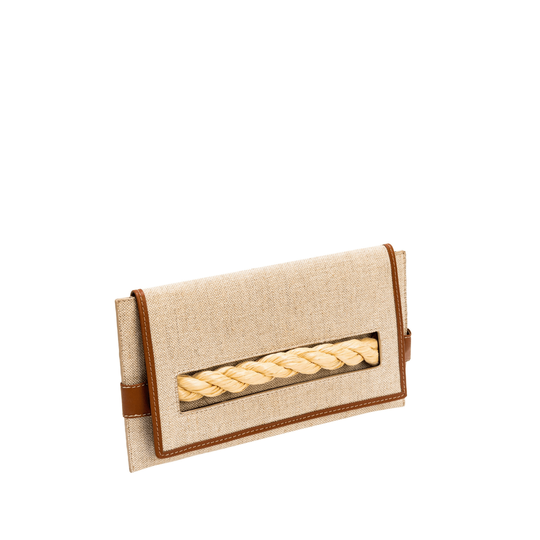 Thory Camello Envelope Clutch in natural canvas with camello leather trim and twisted raffia closure.