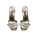 Valeria Sahara High-Heel Sandal with metallic leaf embroidery, reflecting nature's beauty and strength.