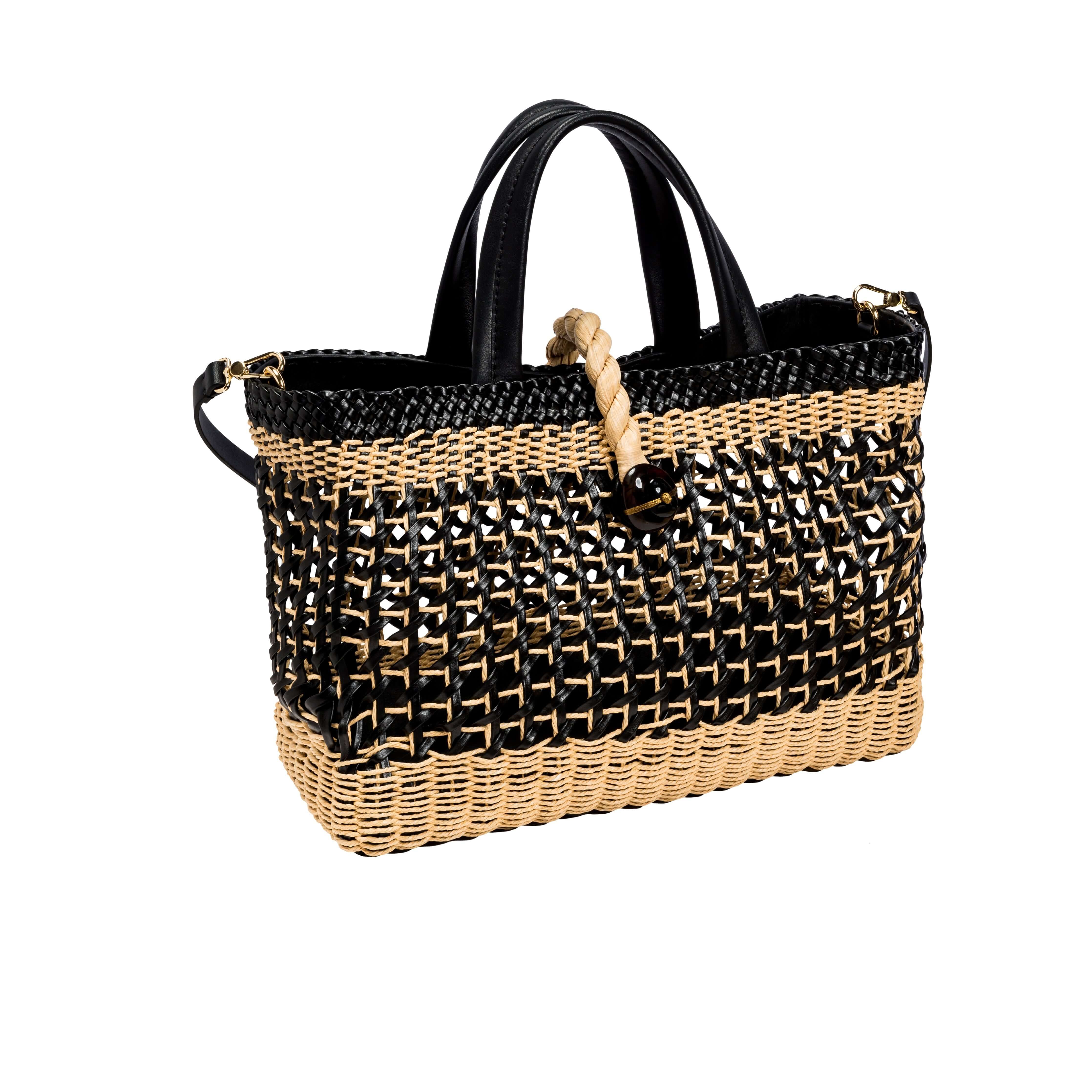 Almeria large shopping bag with black and natural raffia weave and sleek leather trim, perfect for everyday luxury.