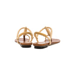 Iris Camello Flat Toe Sandal featuring a stylish design with braided straps, perfect for summer wear.