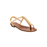 Iris Camello Flat Toe Sandal featuring a stylish design with braided straps and a comfortable flat sole.